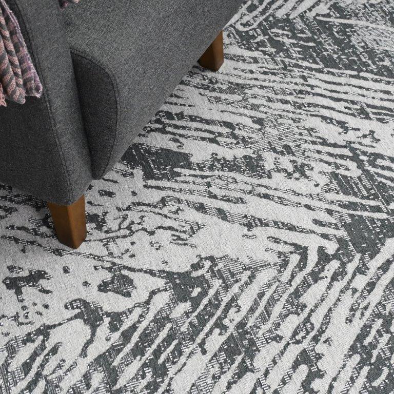 Alexa sileäksi kudottu matto - harmaa.