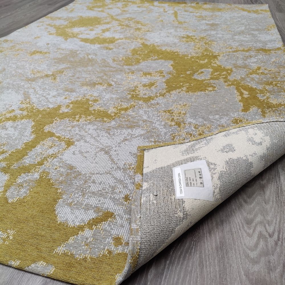 Carissa sileäksi kudottu matto - okra.