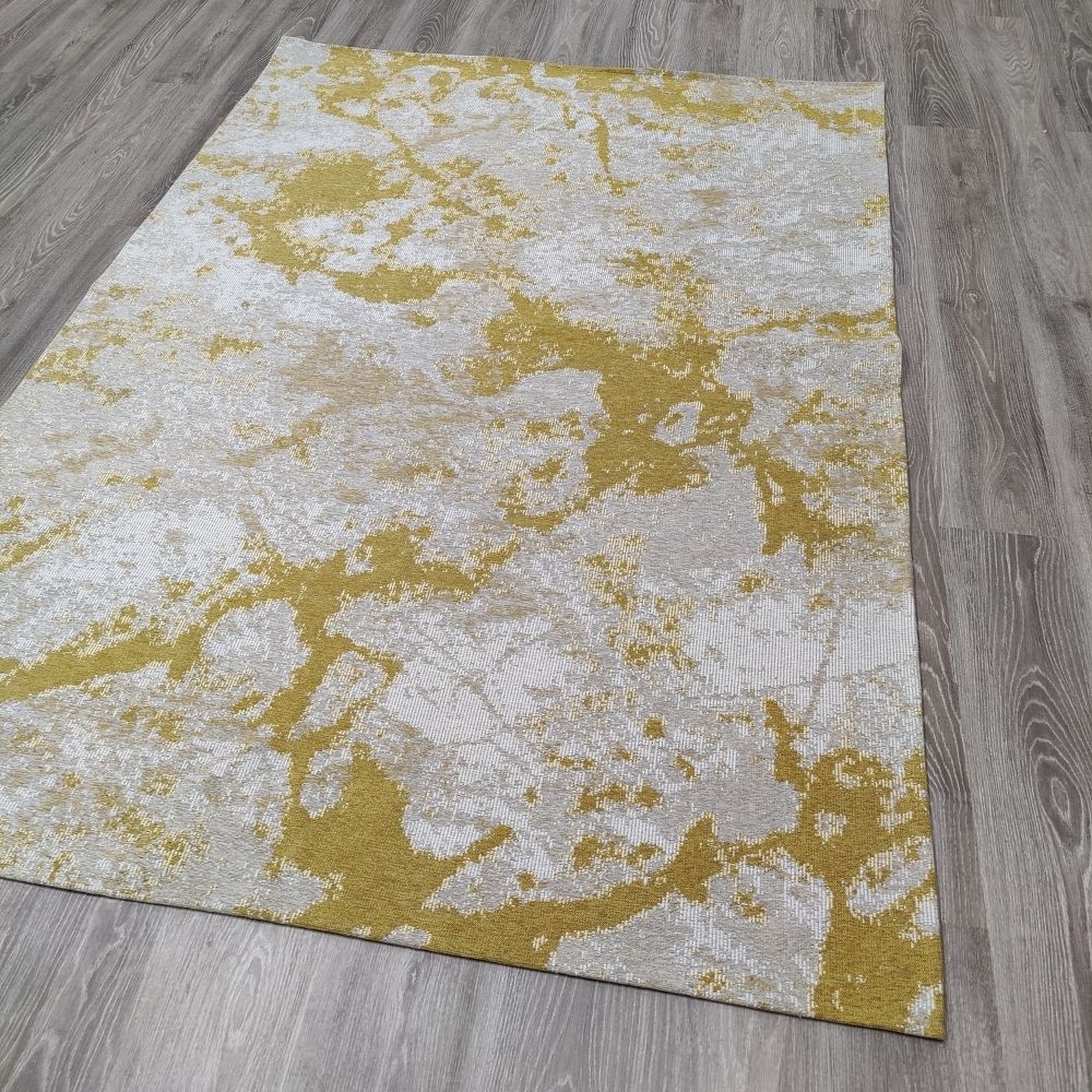 Carissa sileäksi kudottu matto - okra.