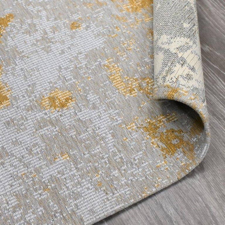 Carissa sileäksi kudottu matto - okra.